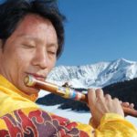 Tibetan flute player plays concerts by heart